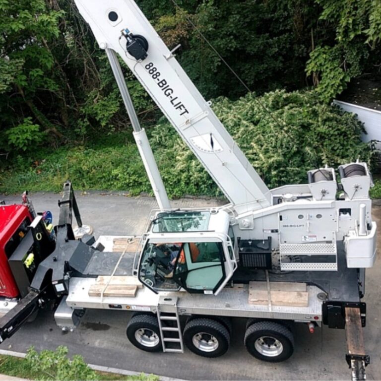 DJ Snyder white crane truck set up at a job site